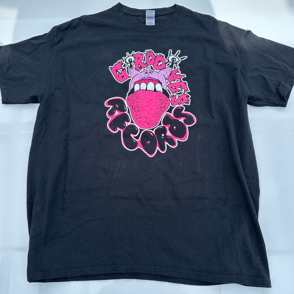 Grooves Graphic Tee with Hot Pink Tongue Art
From Grooves in London Ontario